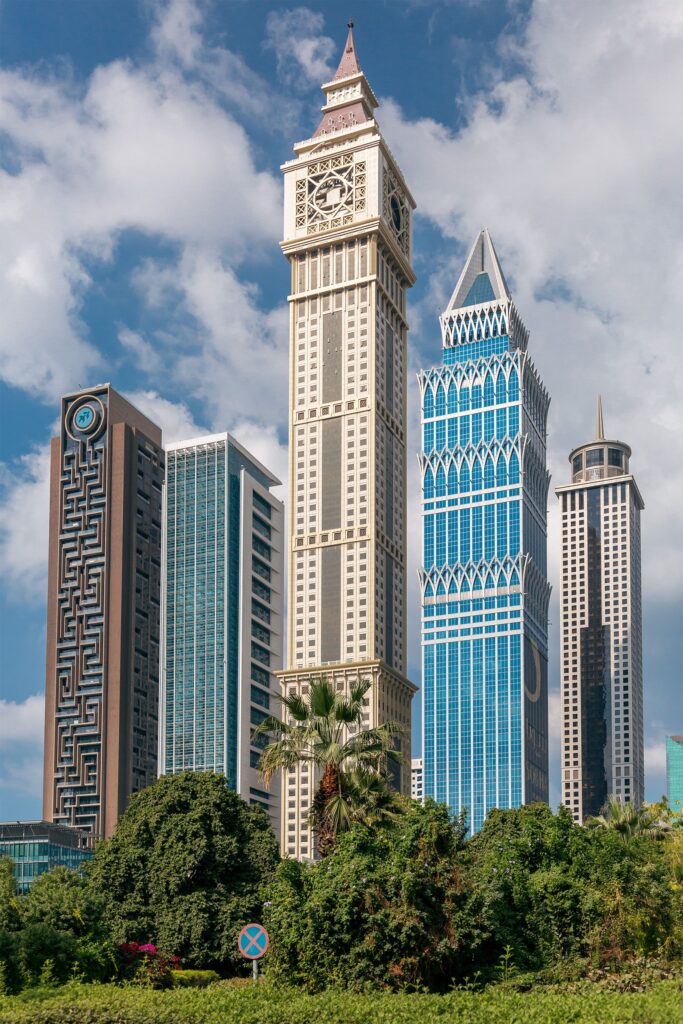Modern skyscrapers in Dubai's financial district representing investment, capital formation, finance, and the technology economy.